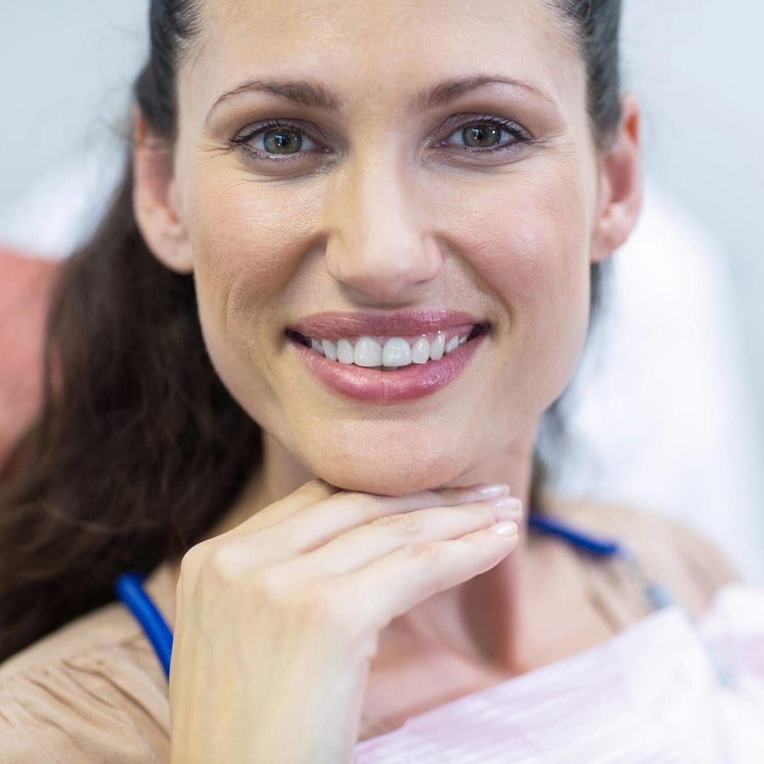 SMILING WOMAN INVISALIGN PROCEDURE HITCHIN DENTAL PRACTICE scaled uai